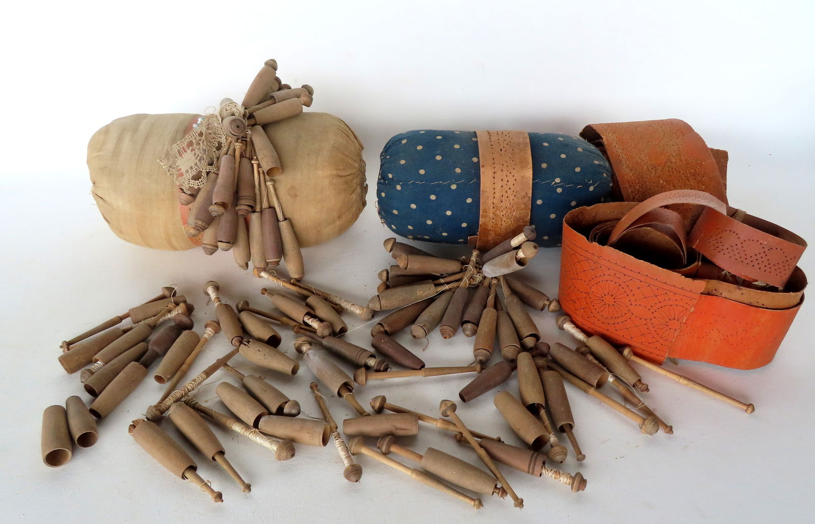 Early lace making tools including bobbins and cardboard patterns, 19th century. (1 of 11)