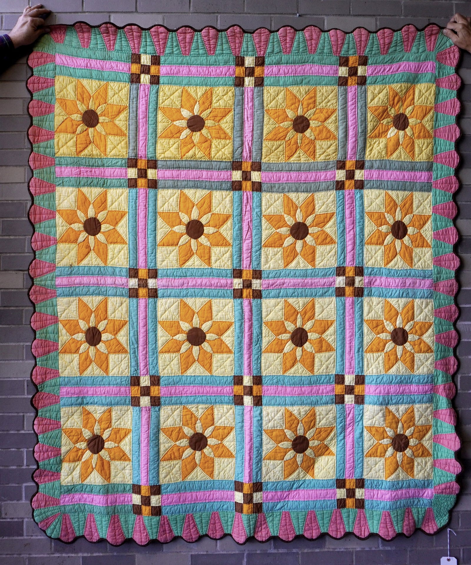 A colorful patchwork quilt with scalloped border decorated with sunflowers, hand sewn, very good (1 of 7)