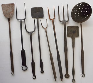 A grouping of 9 early iron kitchen utensils, 2 with maker's mark, most hand forged, late 18th to
