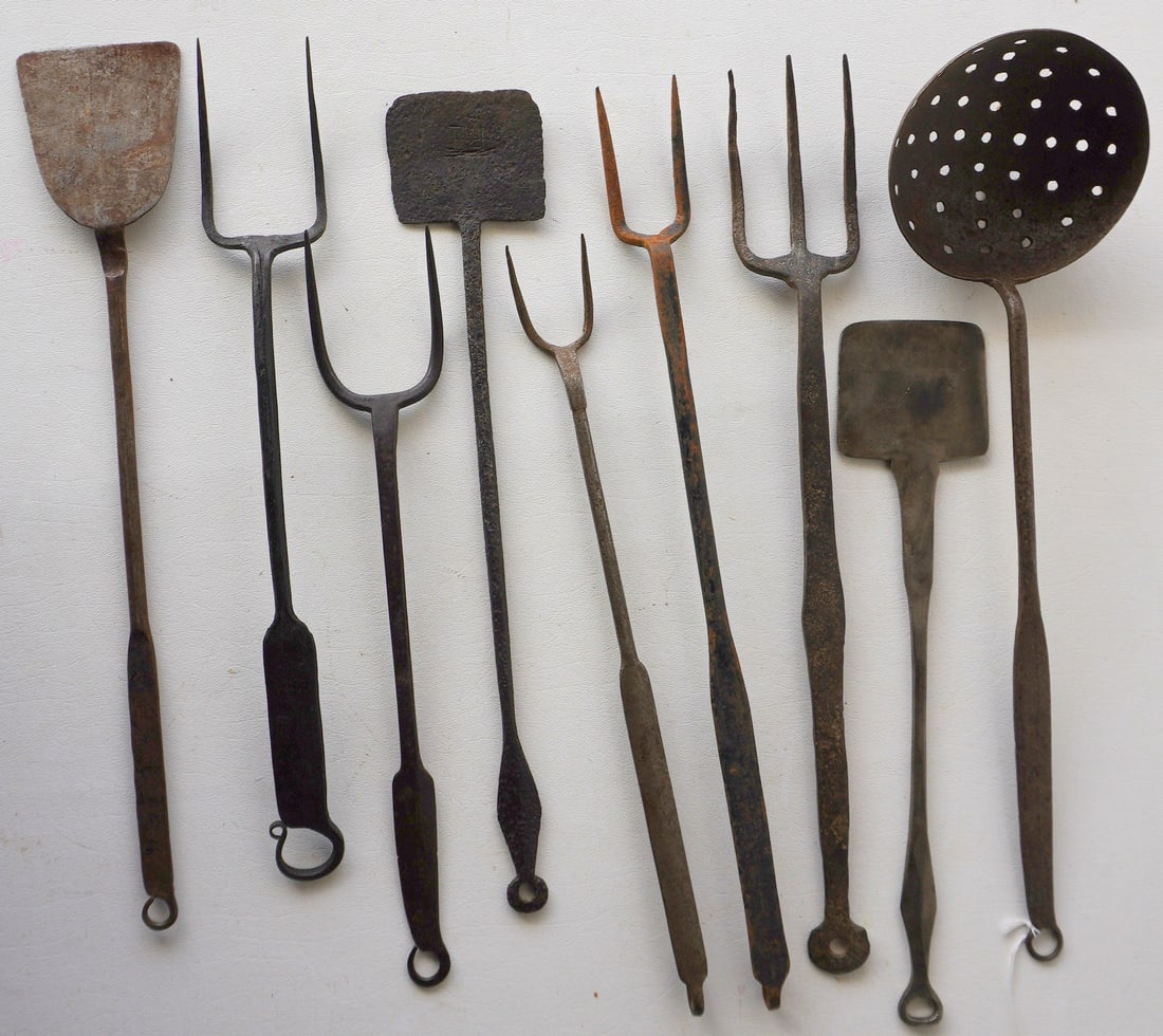 A grouping of 9 early iron kitchen utensils, 2 with maker's mark, most hand forged, late 18th to (1 of 13)