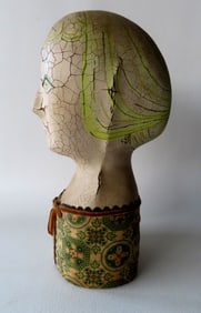 A French millinery head, composition is bisque-like and similar to doll's head in construction -
