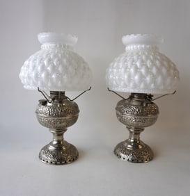 Two fancy matching Miller nickel plated oil lamps with matching shades.  Signed "The Miller Lamp /