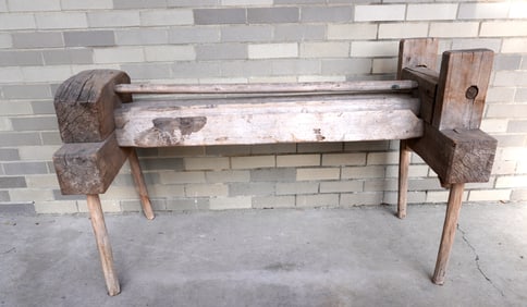 A primitive farmer's flax breaking bench, 19th century - good working condition. Measures 50 1/2"L x