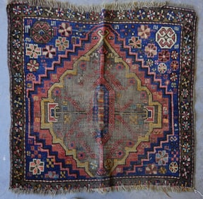 Small oriental rug, 19th century, extensive use wear - losses to fringe area, but still vivid