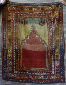 Oriental prayer rug, hand knotted, late 19th century. One stain hardly noticeable on front but most