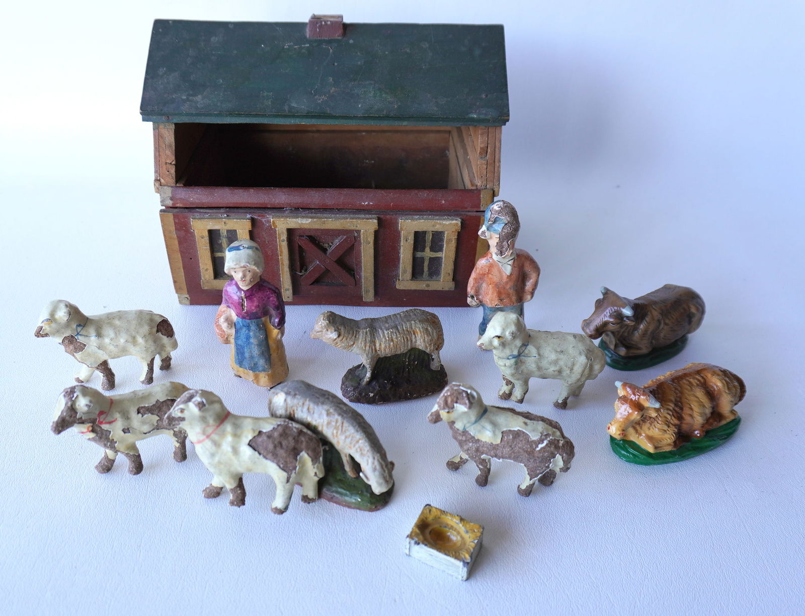 A hand made wooden barn model with pull-out lower drawer, and  in original paint with various farm (1 of 8)