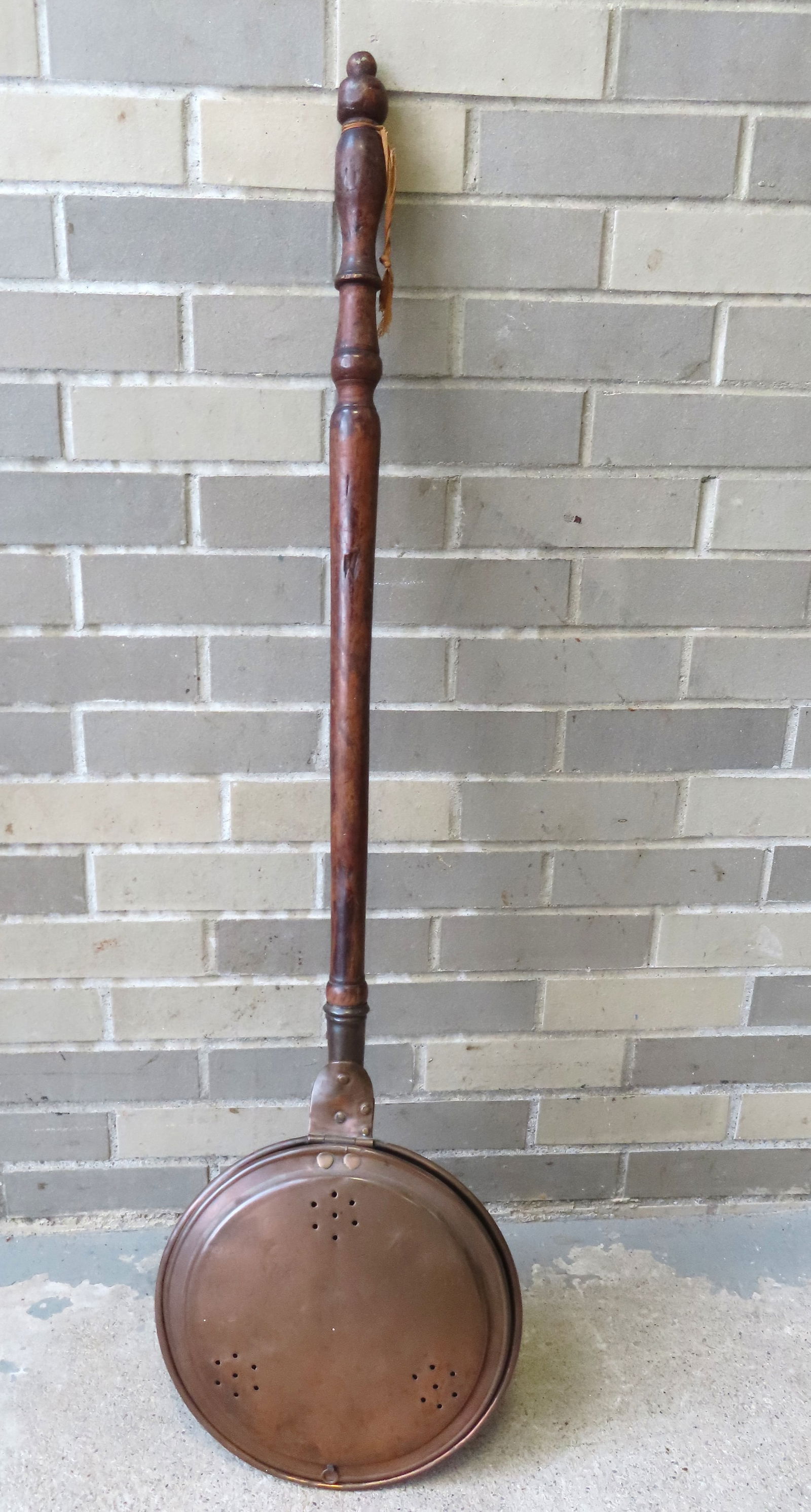 A brass bed warmer with long turned wooden handle, early to mid 19th century. (1 of 4)