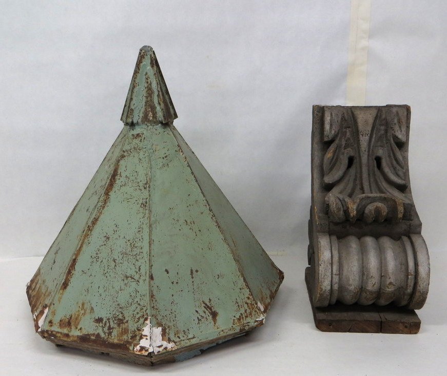 Two architectural building ornaments including a tin: Two architectural building ornaments including a tin finial 22"H x 23"D and a wooden cornice with some losses - 17"H x 10.5"L - both 19th century in old paint.