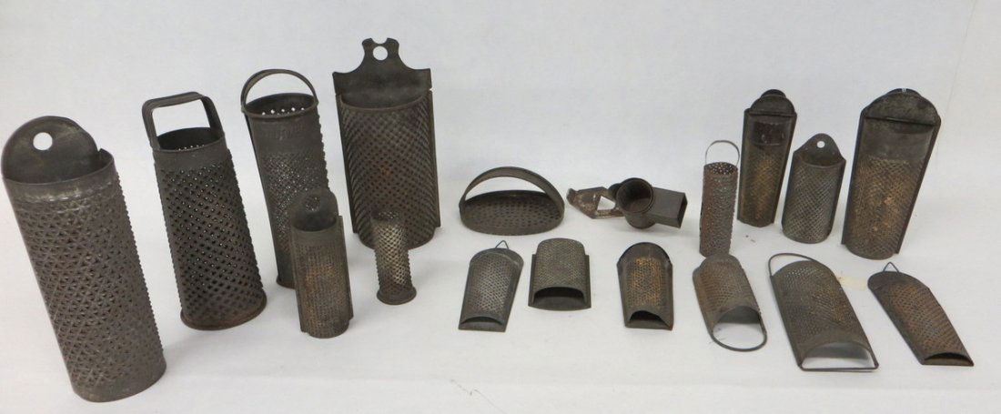 Lot of 10 early tin graters including nutmeg, chees: Lot of 10 early tin graters including nutmeg, cheese, etc. Size range 4"H to 7.75"H.
