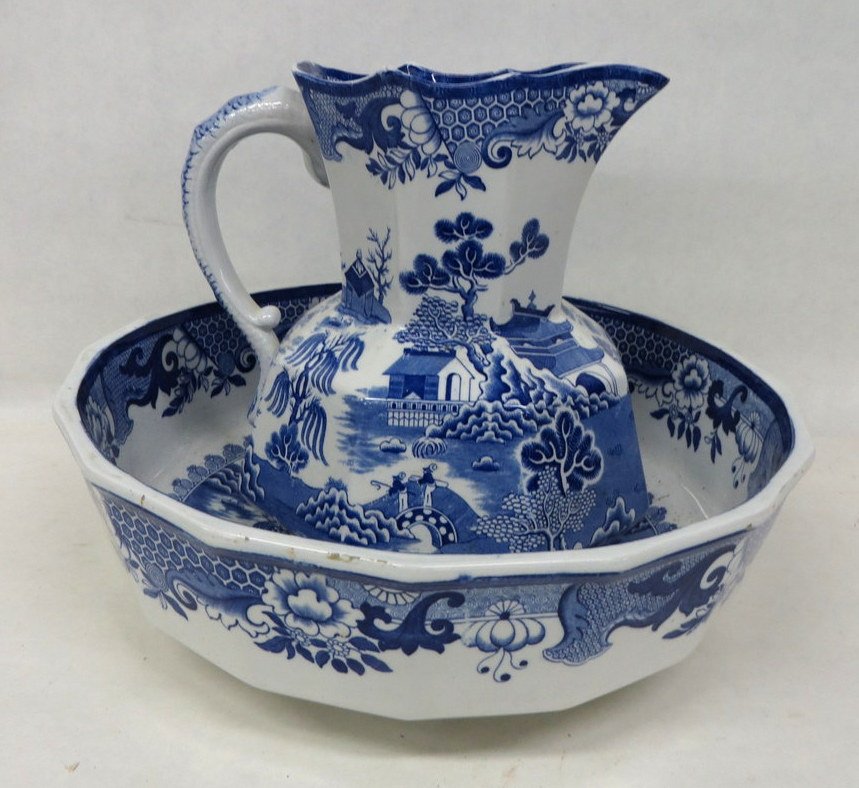 Blue & white transferware bowl and pitcher set wit: Blue & white transferware bowl and pitcher set with oriental motif, handle in the form of a sea serpent (hand painted), signed Mason's Ironstone China.