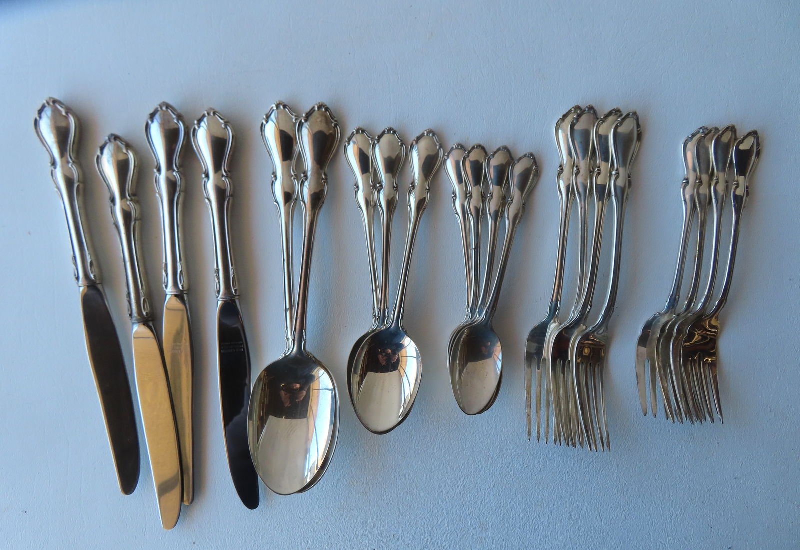 Grouping of 21 pieces of Reed & Barton Sterling silver flatware in unknown pattern, all in very good