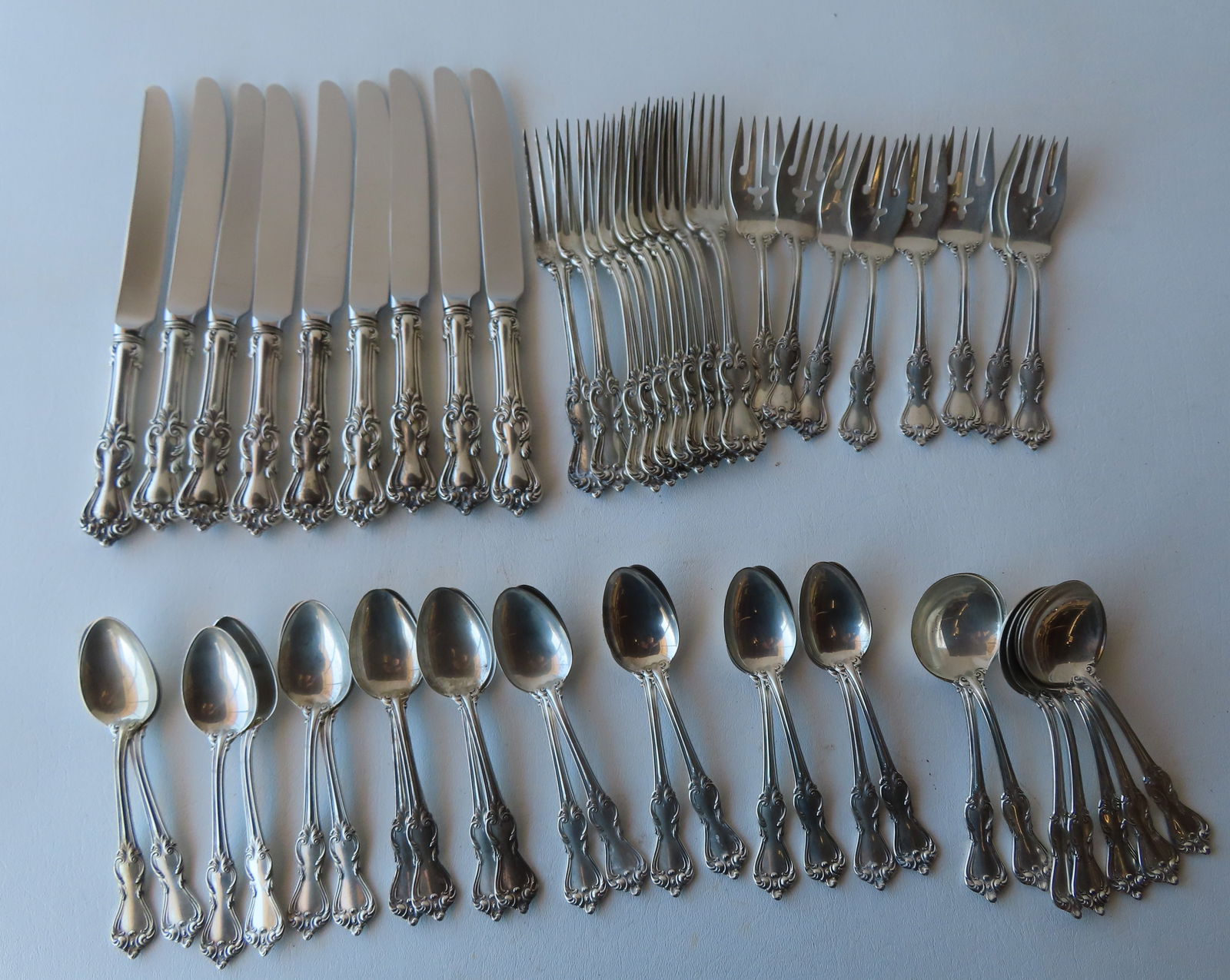 A set of 51 pieces of Reed and Barton, Marlborough pattern sterling silver: 7 bouillon spoons, 9 (1 of 8)