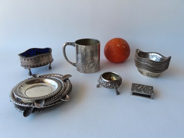 Grouping of sterling silver collectibles including salt with cobalt blue glass insert, nut dishes,