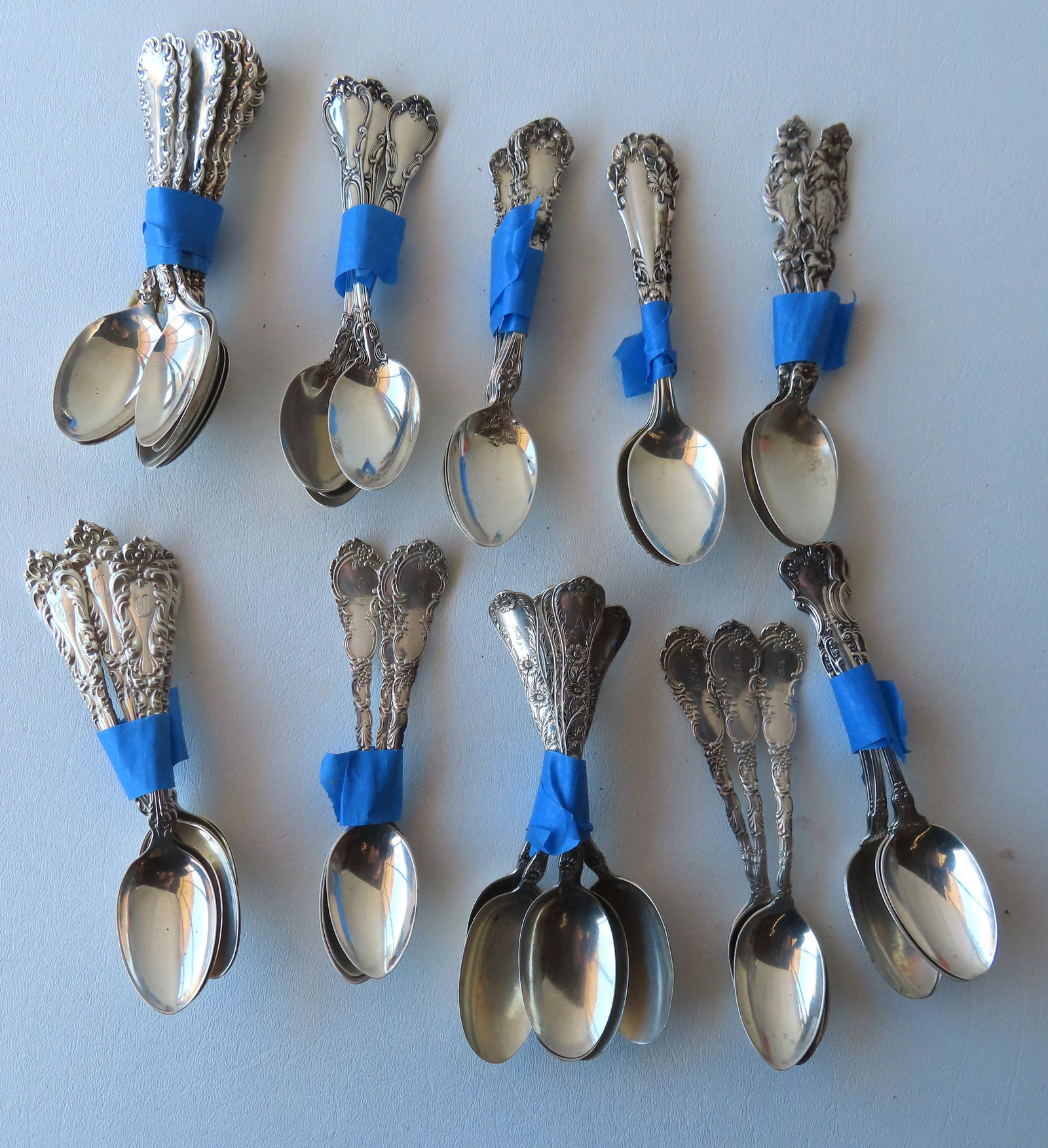Grouping of 43 sterling silver spoons, sets of 2, 3, 4, 5, and 6 by various makers. All in very good (1 of 12)