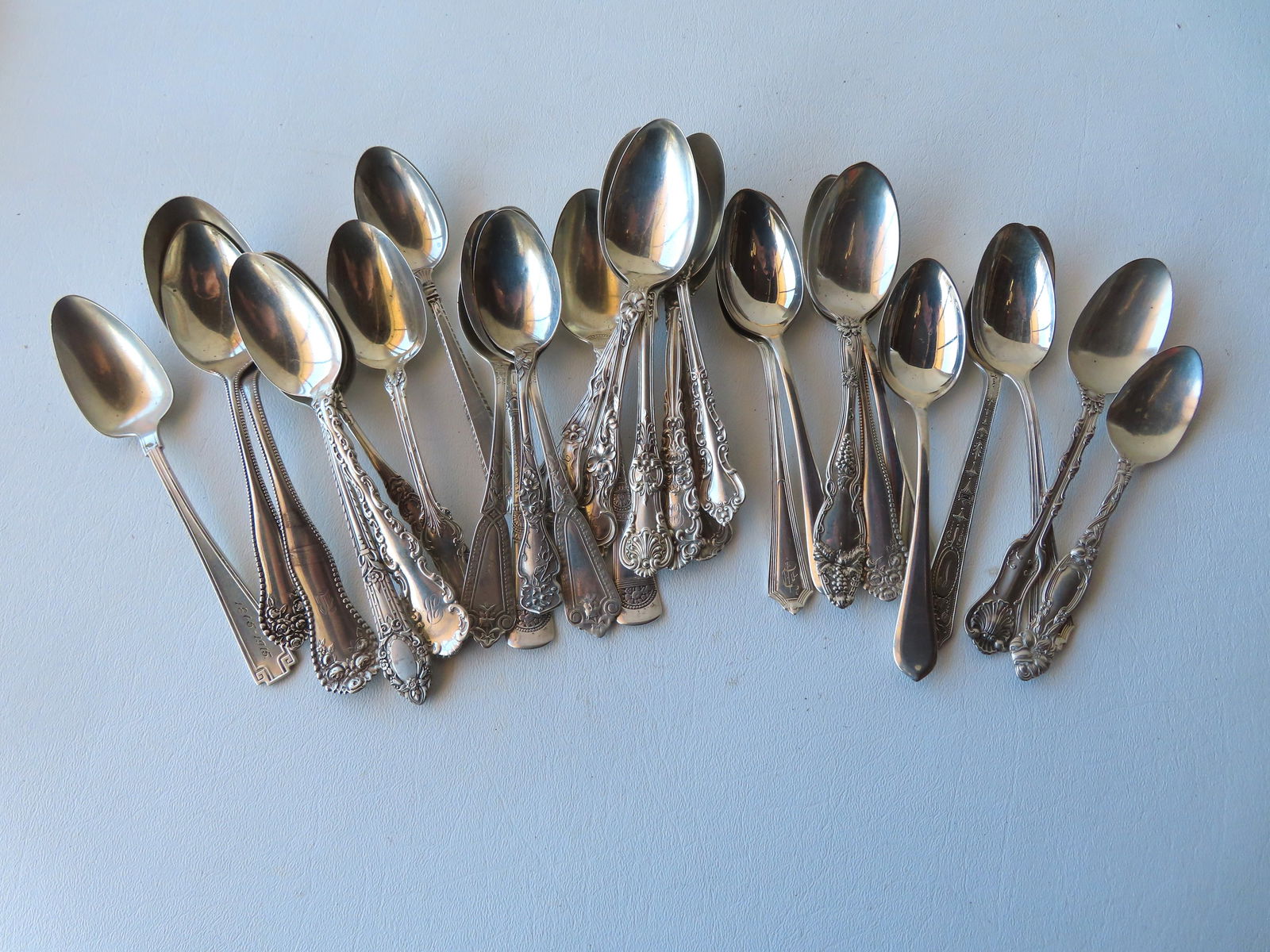 Grouping of 30 sterling silver spoons, most non-matching patterns, and in very good condition. The (1 of 1)