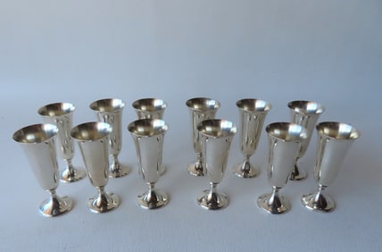 A boxed set of 12 Gorham sterling silver cordial cups, all in very good condition in original box