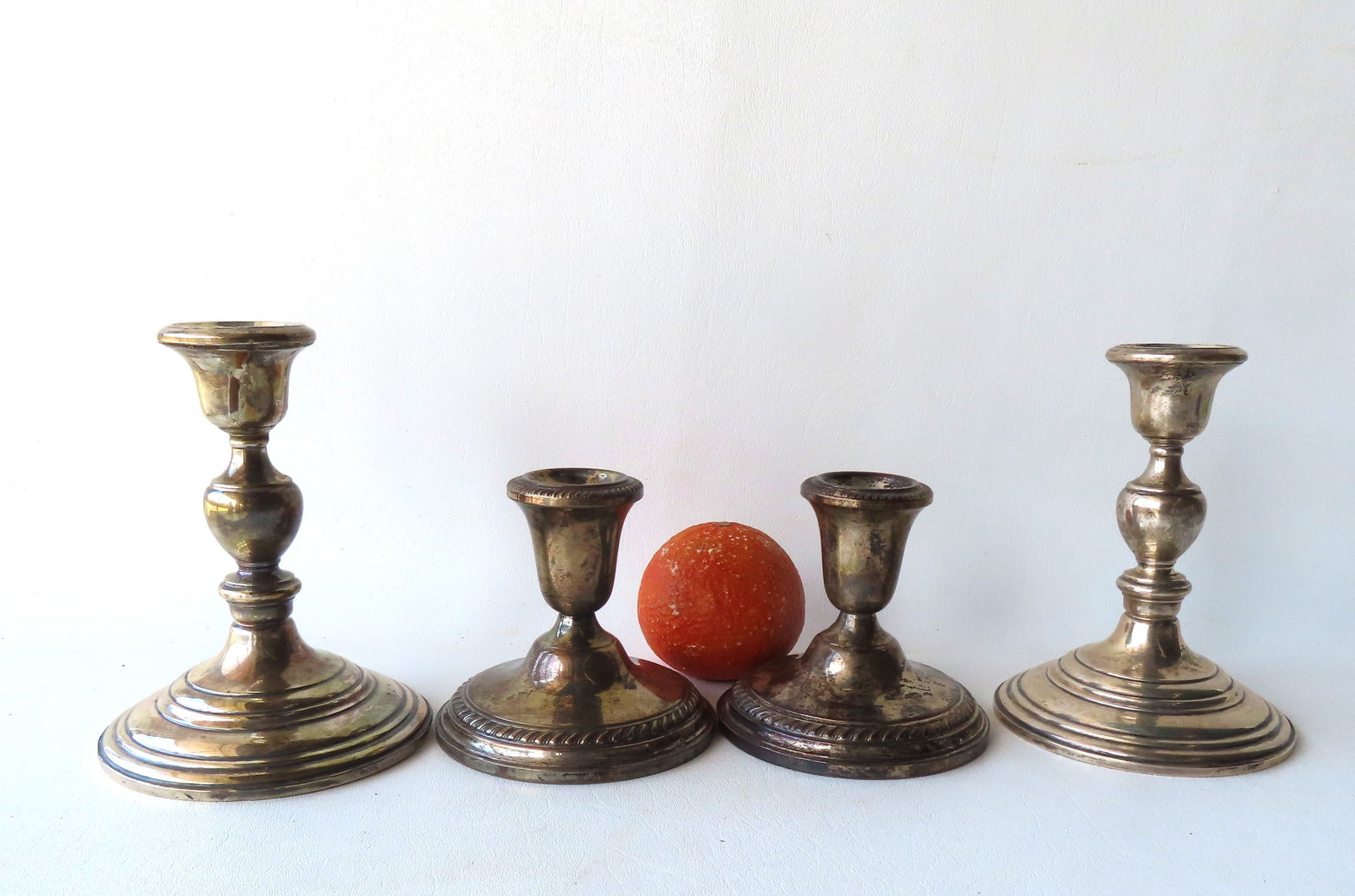 Two pair of weighted sterling silver candlesticks, the largest xx. All in good condition. (1 of 4)