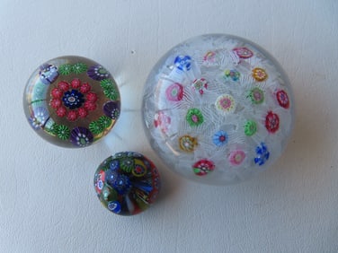 Three millefiore glass paperweights, the largest signed Baccarat - 3" diameter , the smaller 2 not