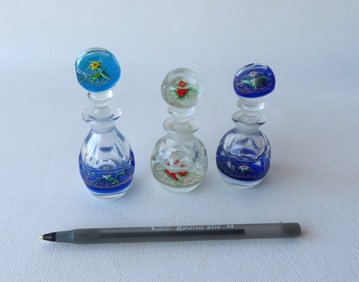 CHARLES KAZIUN, Mass. 1919-1992. Three miniature multi-faceted perfume bottles - paperweights, all