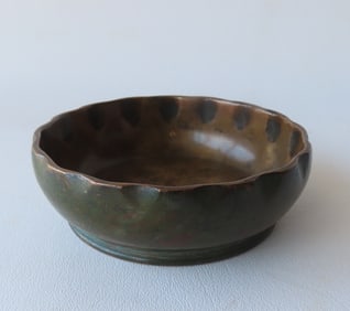 Small "Tiffany Studios / New York / 1719" bronze bowl with ruffled edge. Minor surface wear and