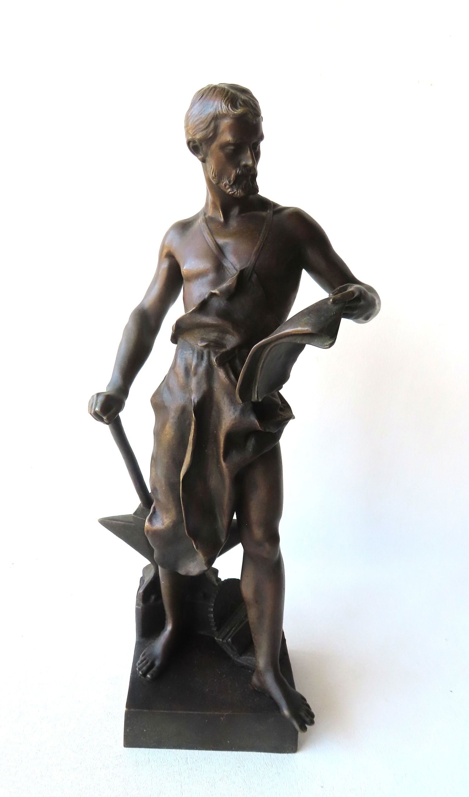 Jean-Baptiste Germain, France 1841 - 1910. A bronze sculpture of "The Blacksmith" standing by anvil: Jean-Baptiste Germain, France 1841 - 1910. A bronze sculpture of "The Blacksmith" standing by anvil holding scroll, signed "Germain JB", late 19th century - very good condition - measures 15 1/4"H.