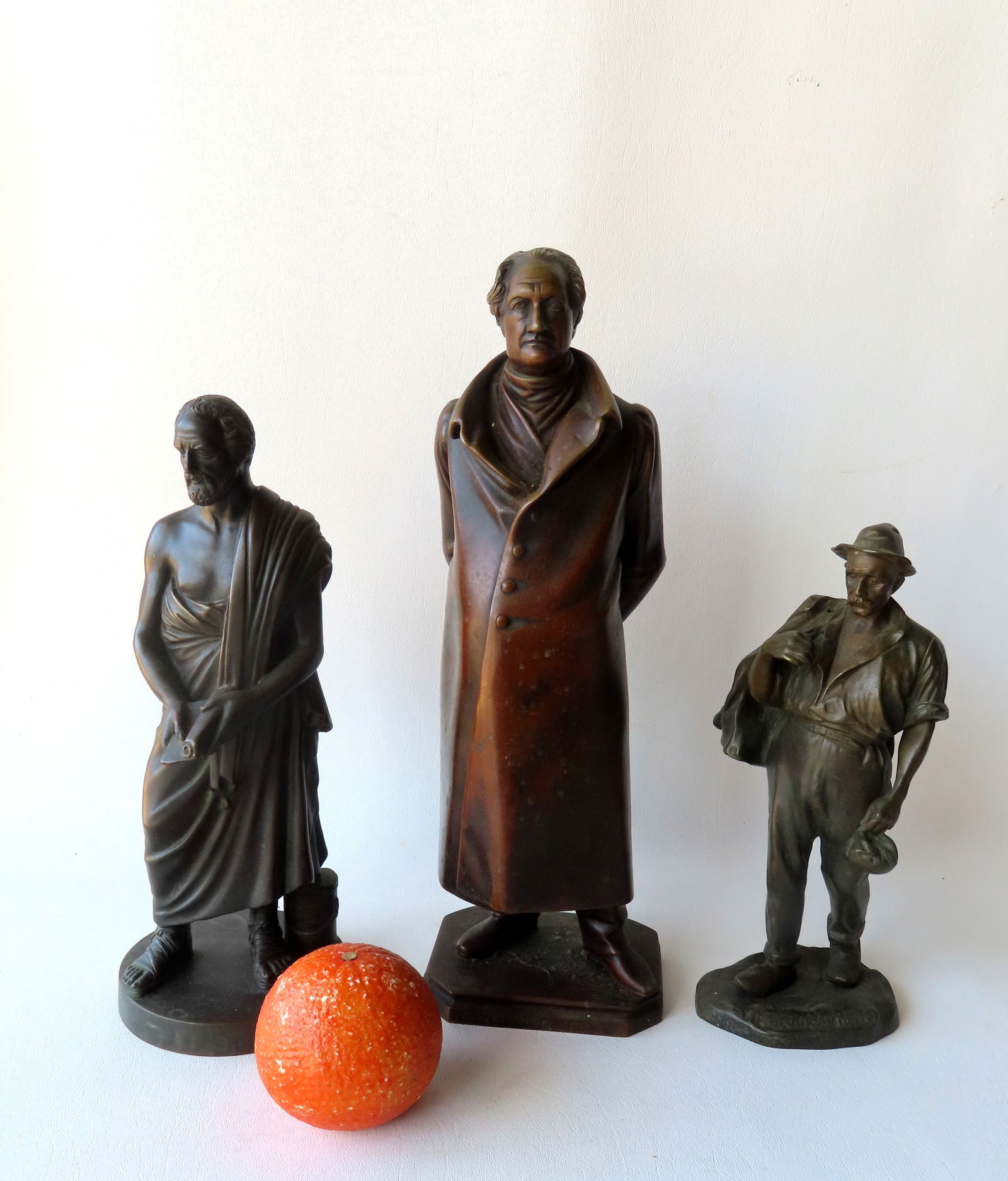 Grouping of 3 bronze sculptures, 19th and 20th century, including: Sculpture of Greek orator and (1 of 12)