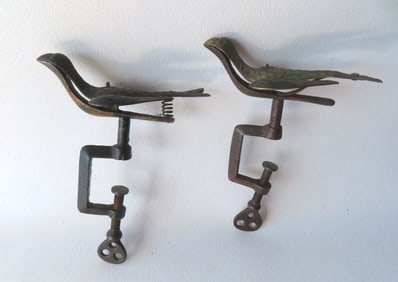 Two sewing birds, 19th century, both missing pincushion tops otherwise good condition.