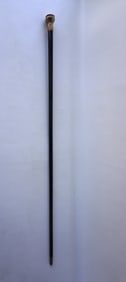 A vintage ebony walking stick with engraved gold handle. The fancy engraved handle is in very good