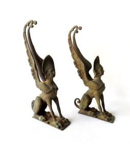 A pair of gilded bronze Sphinx figural ornaments, probably late 19th century - one wing with 1/4"