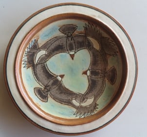 Walter Addison, New York, 1914-1982. A terra cotta hand painted charger decorated with stylized