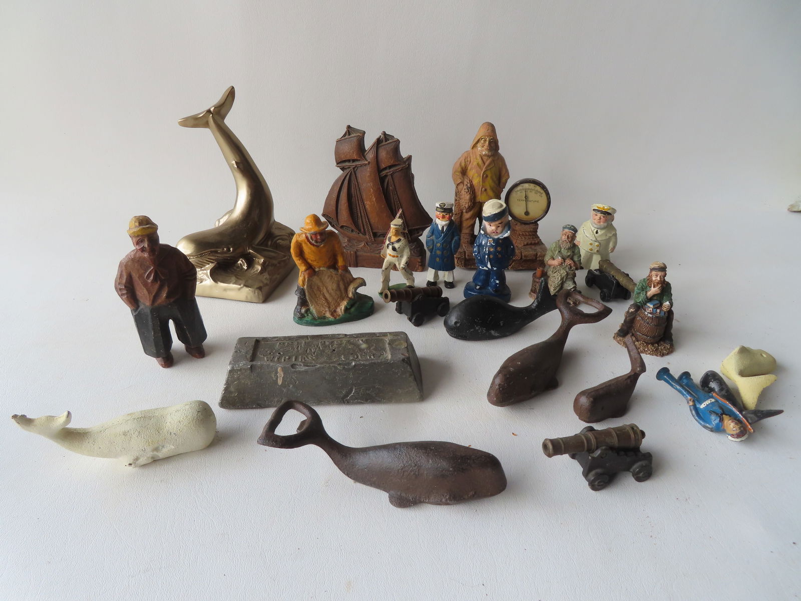 Large grouping mostly nautical related metal figures, some cast iron, mid to late 20th century. (1 of 2)