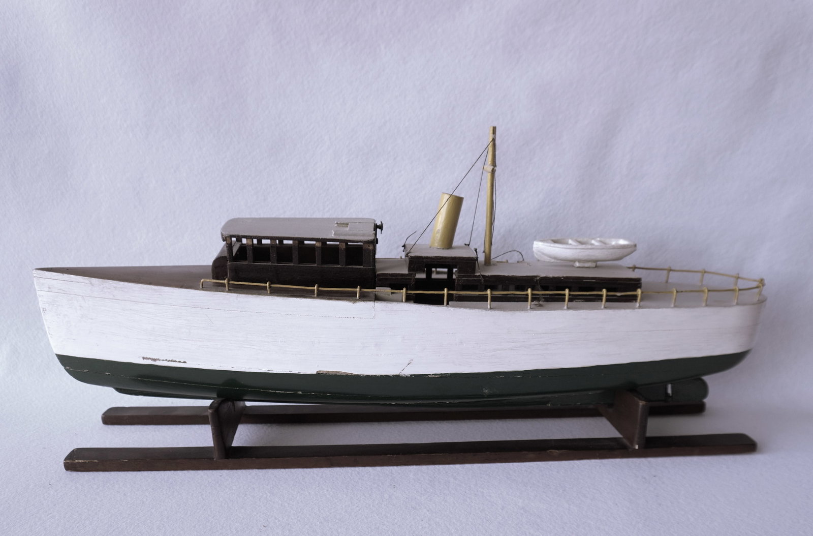 A handmade wooden boat model in original paint, solid laminated hull construction, early to mid 20tA (1 of 5)