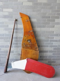 Two vintage boat rudders, both in good condition, one painted with long handle and with a woven