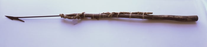 A hand forged iron whaling harpoon, probably early 19th century - good condition with a newer wooden