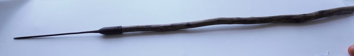 Hand forged iron whaling killing lance, with long thin iron shaft attached to a long wooden handle,
