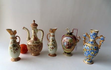 Grouping of 4 porcelain decorative objects including: A Zsonay Austrian chocolate pot with