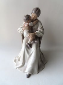 Large Bing & Grondahl porcelain sculpture of seated lady holding small boy her lap, Denmark #1552.