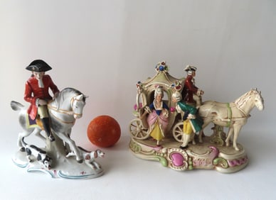 Two porcelain figurines: The first a hunt scene with horse, rider, and 2 hounds signed with German