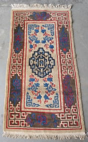 Oriental (Tibetan) scatter rug, hand knotted, early 20th century, good condition. Measures 2' 11" x