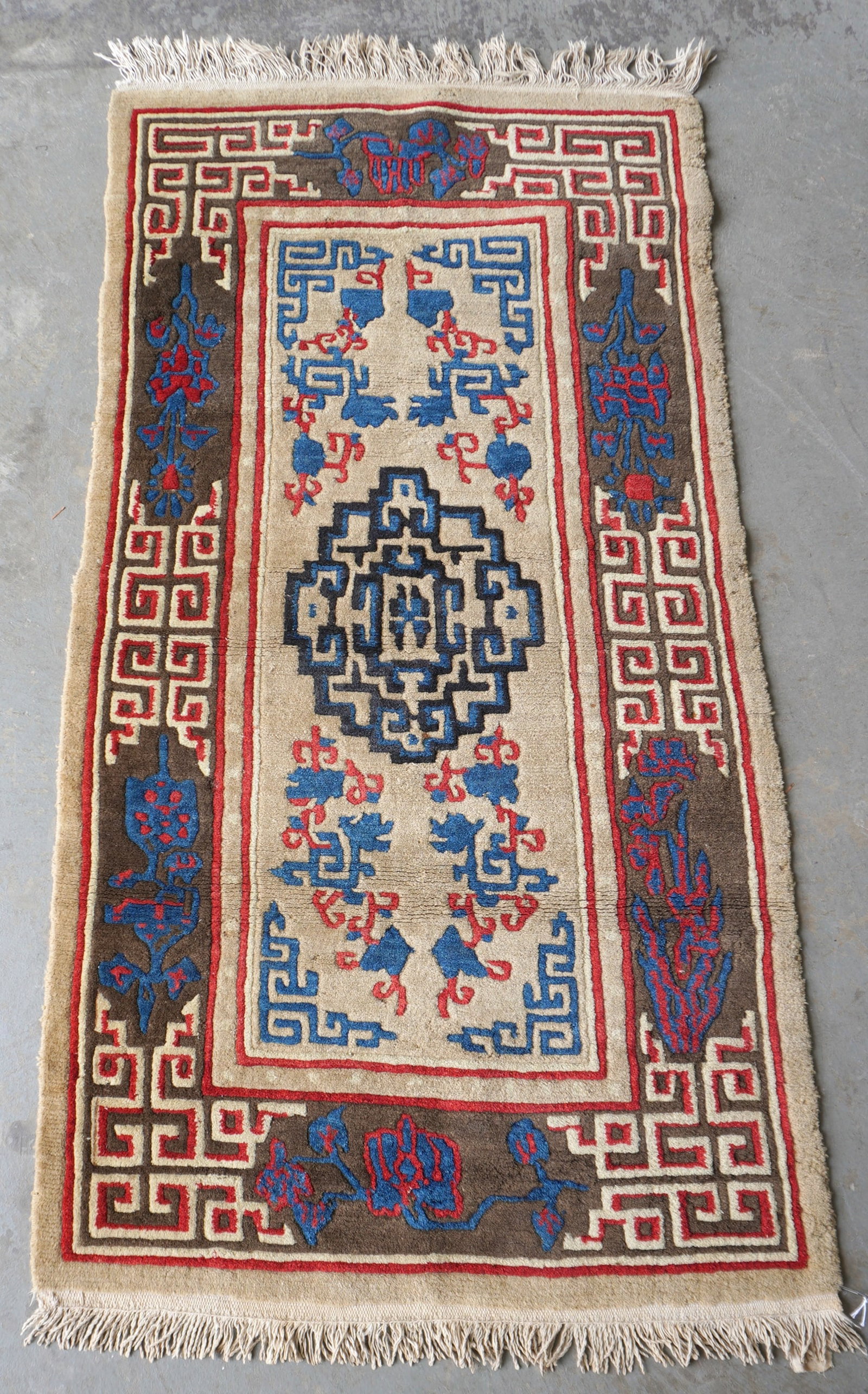 Oriental (Tibetan) scatter rug, hand knotted, early 20th century, good condition. Measures 2' 11" x: Oriental (Tibetan) scatter rug, hand knotted, early 20th century, good condition. Measures 2' 11" x 5' 7".