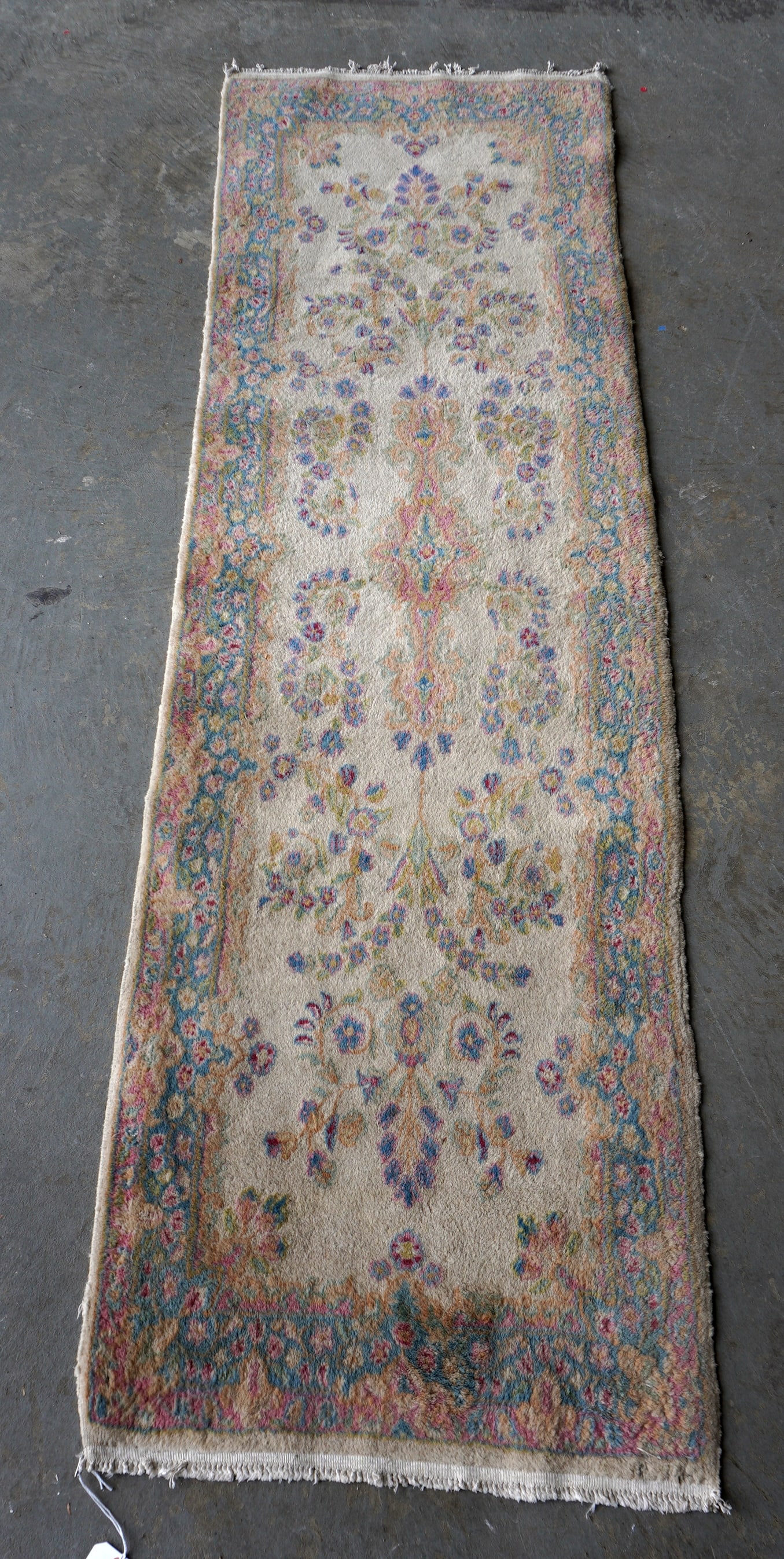A good Kerman runner measuring 7' 6" x 2' 3" - very good condition, circa 1930. Very tight: A good Kerman runner measuring 7' 6" x 2' 3" - very good condition, circa 1930. Very tight weaving/knotting.