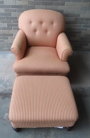 A modern upholstered parlor chair and ottoman in very good - no wear to fabric - 2 tiny stains (see
