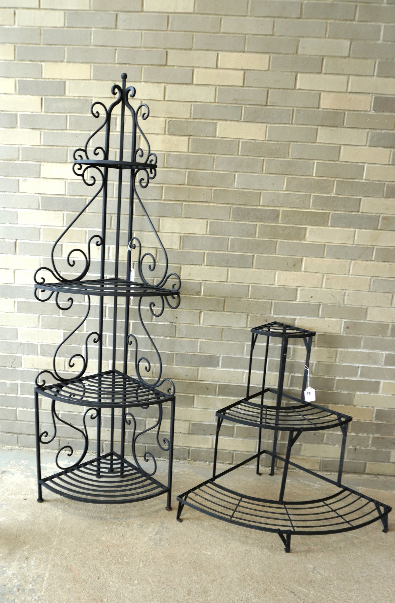 Two wrought iron corner plant stands, both in very good condition. The largest measures 21 1/2"W x (1 of 6)
