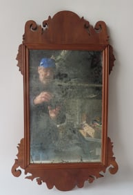 A mahogany Chippendale mirror, refinished surface - glass possibly original. Illegible inscription
