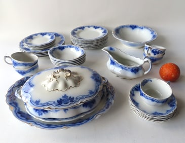 A partial set of Grindley flow blue china, most pieces signed "The Imperial / W.H> Grindley /