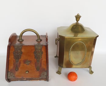 Two coal scuttles with removable tin inserts. The first, a classical brass coal scuttle on footed