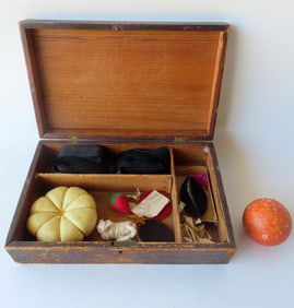 Sewing box, 19th century. The lid with a later painting of hand and flowers, 19th century.