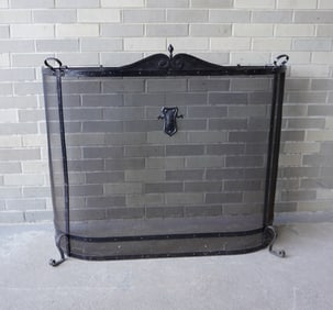 A large Arts and Crafts fireplace screen, circa 1930-40, good condition. Measures 44"W x 12 1/4"D x