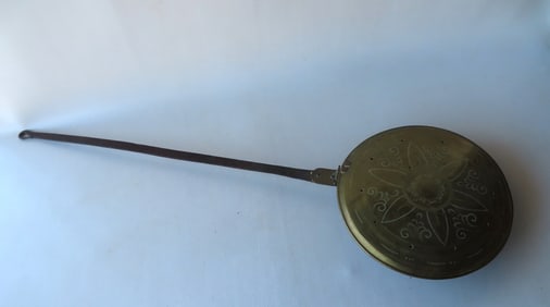 An early brass and iron bed warmer with hand forged iron handle - the lid of copper pot with punched