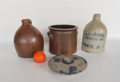Grouping of 3 pieces of stoneware including: 1 gallon jug signed in blue J.J. Duffy 158 River St.
